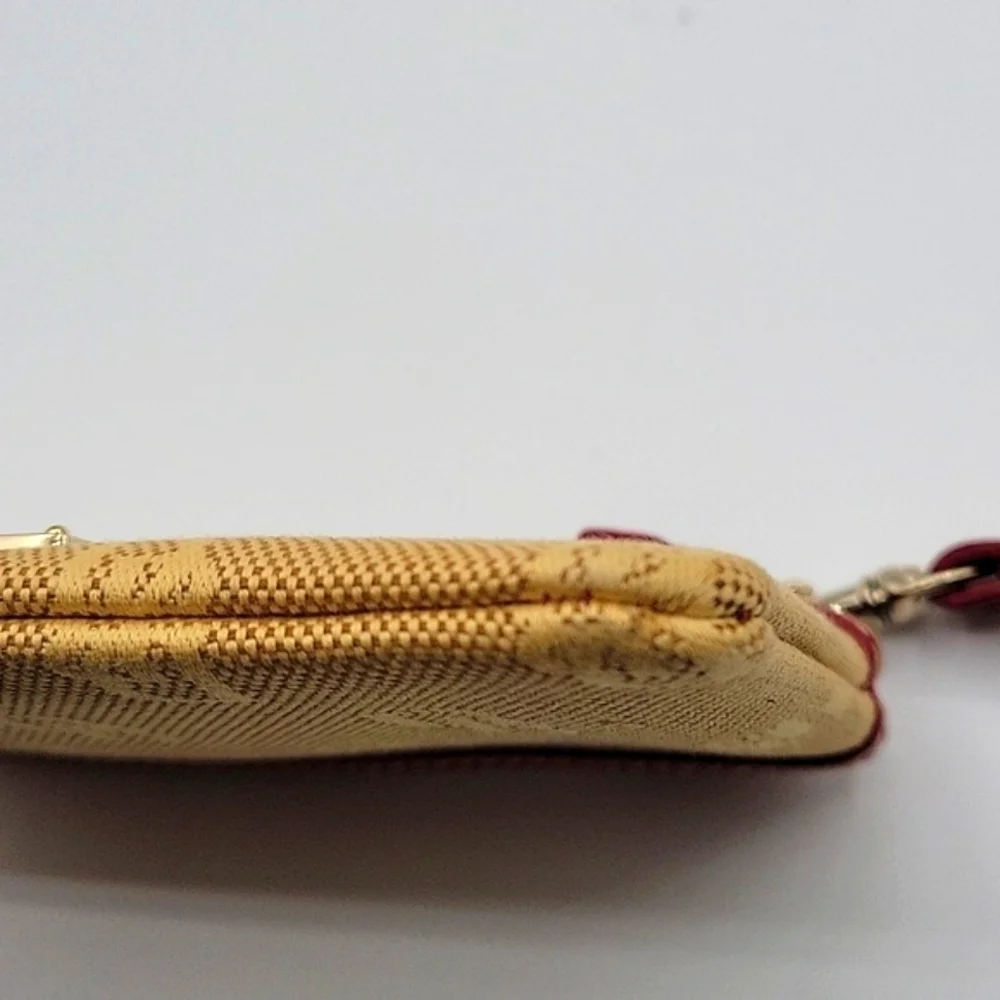 DOONEY & BOURKE Wristlet Tan Canvas DB Logo Red Leather Key Chain inside
